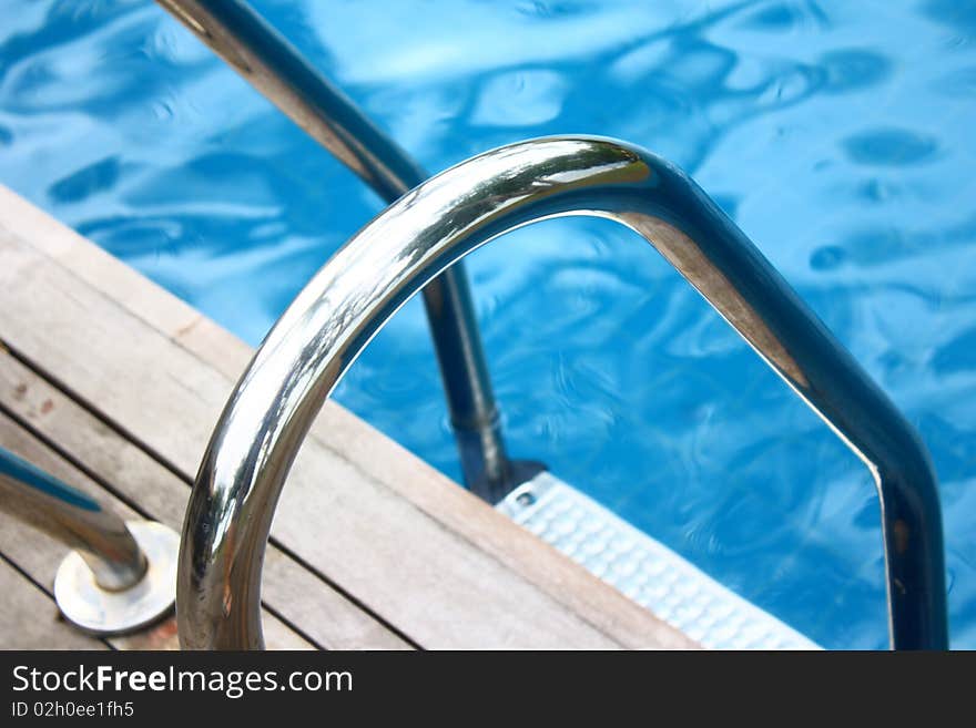 Luxury hotel poolside and ladder