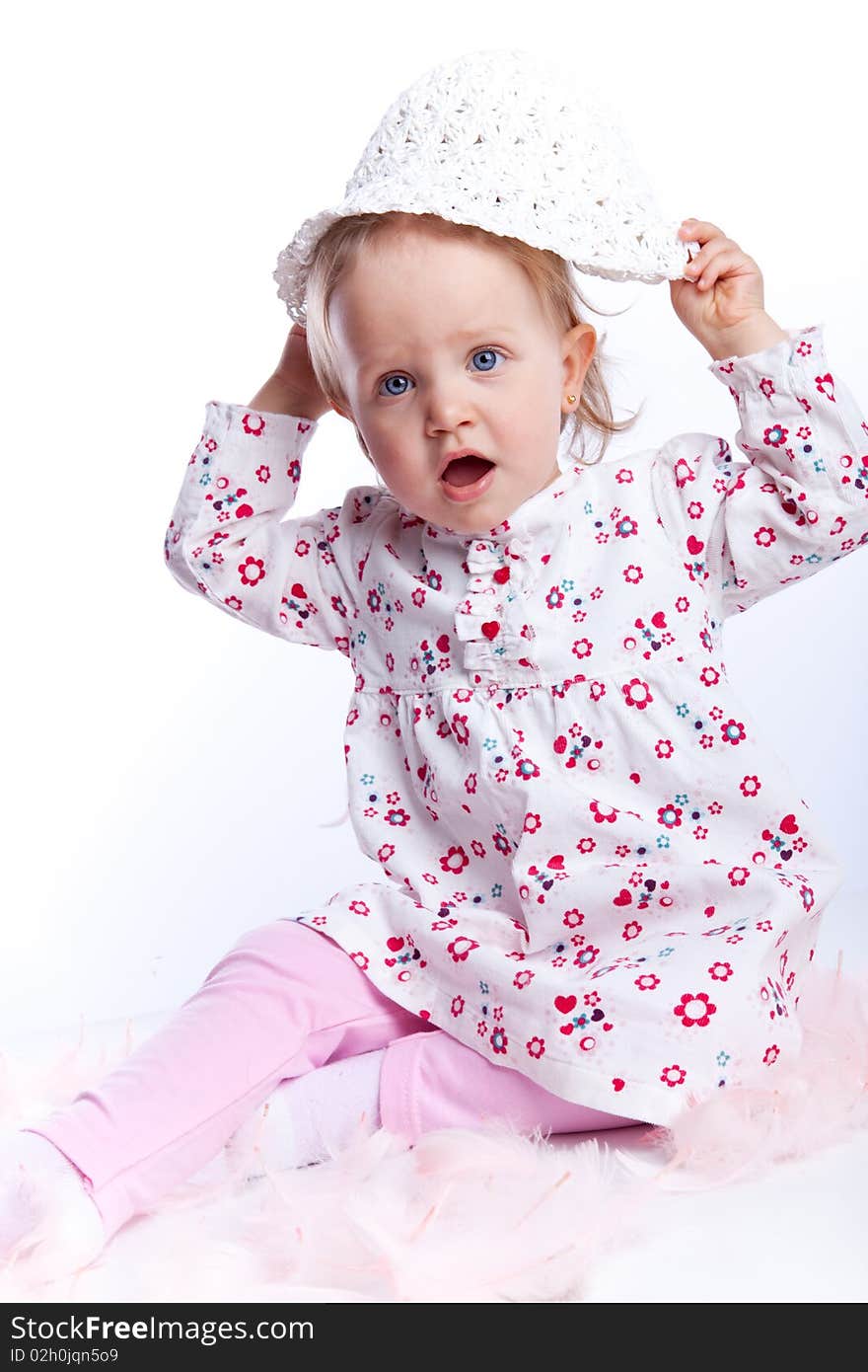 Sweet happy little girl sit over white background