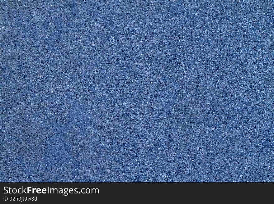 Texture  of the painted  stone  wall, blue with sparkles. Texture  of the painted  stone  wall, blue with sparkles