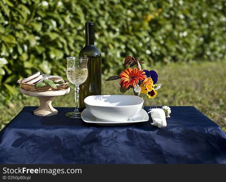 Picnic table in a garden on a sunny day