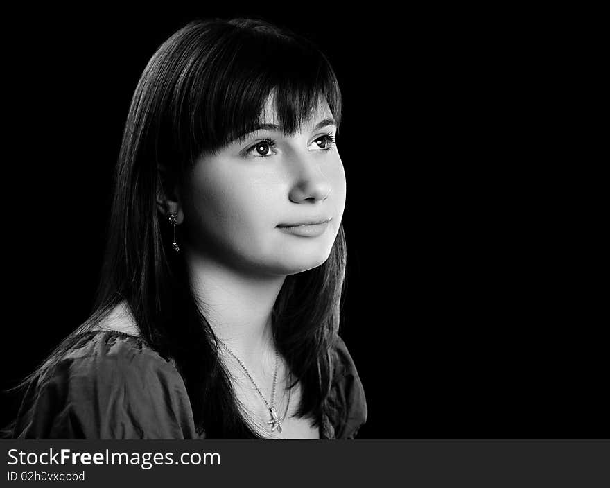 Beautiful girl looking away in black and white image. Beautiful girl looking away in black and white image