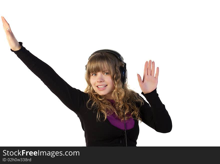 Girl with headphones dancing on a white background. Girl with headphones dancing on a white background