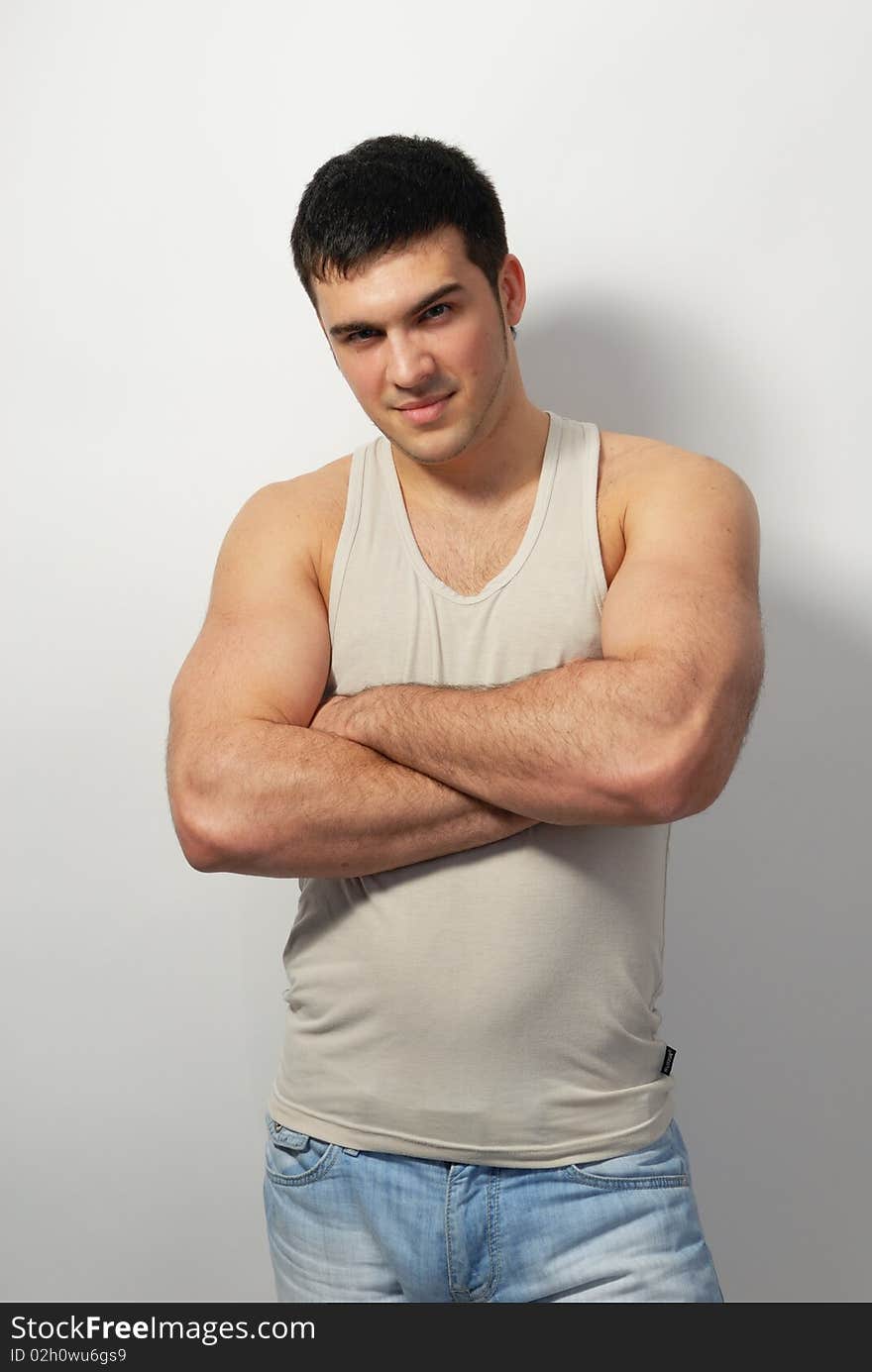 Handsome young man posing in studio. Handsome young man posing in studio