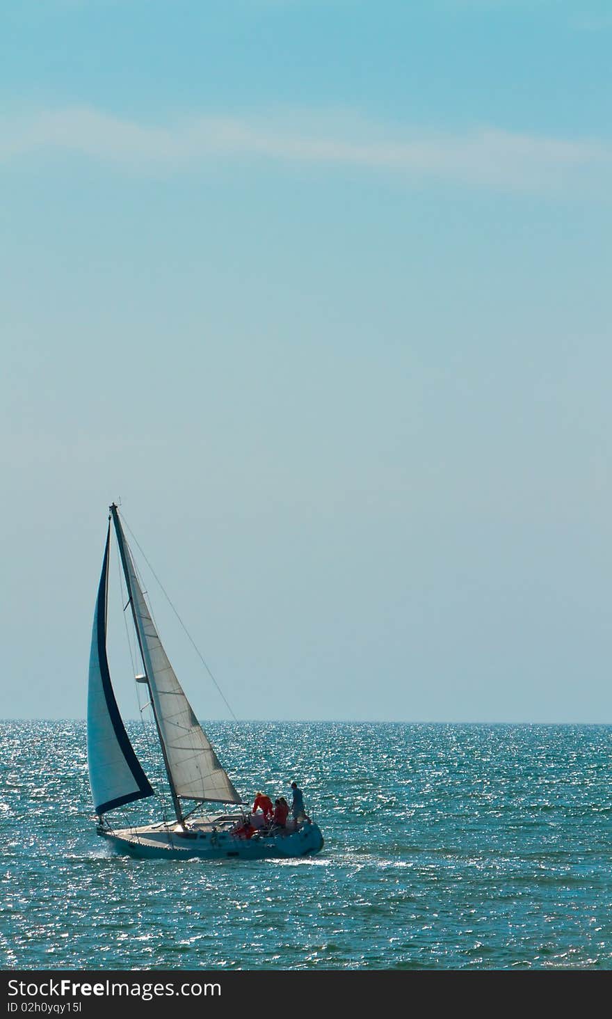 Solitary sailboat at sea on Pacific Ocean. Solitary sailboat at sea on Pacific Ocean.