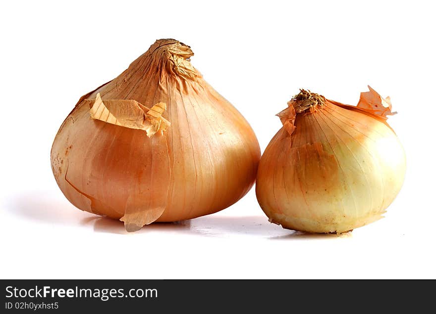 Raw onions generally strong in taste; used in many foods as an essential ingredient. Raw onions generally strong in taste; used in many foods as an essential ingredient