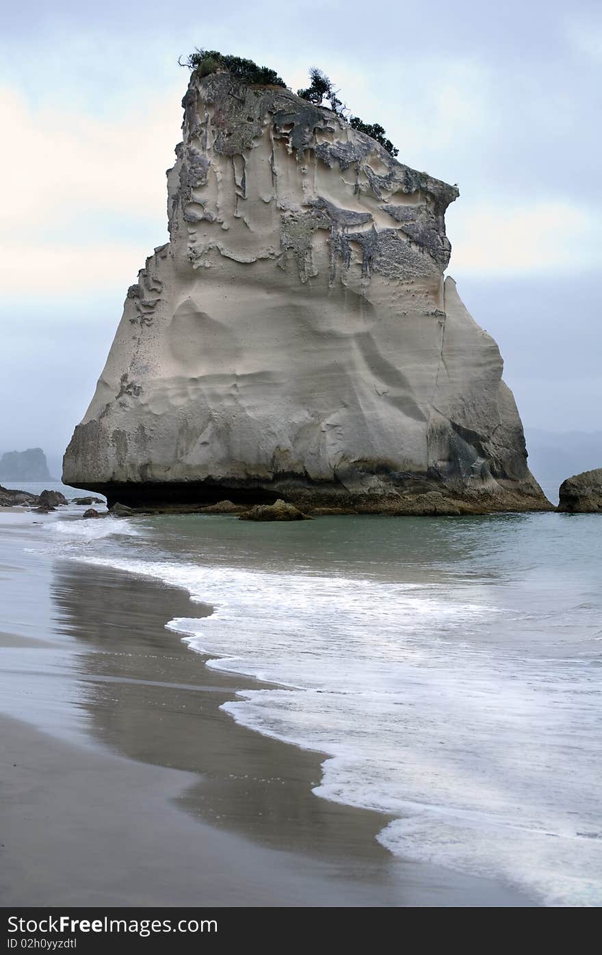 Weathered rock and waves