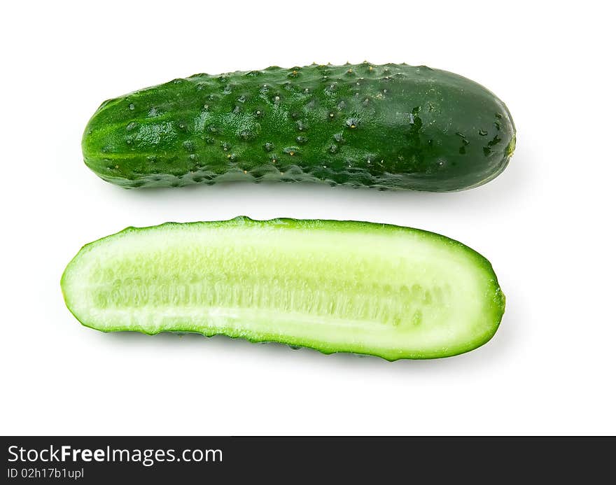 Fresh green cucumbers on a white background