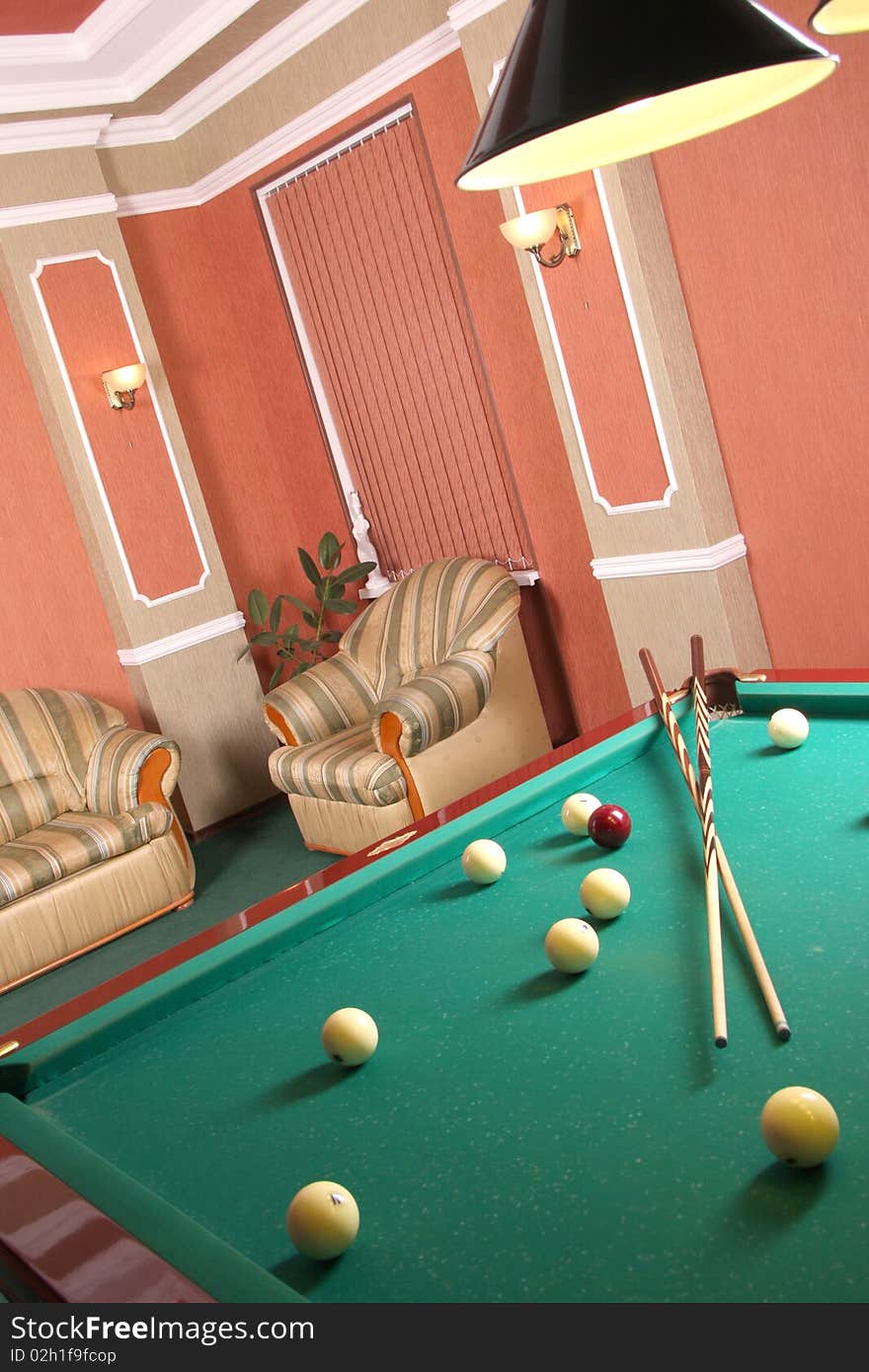 Table for game in billiards in interior