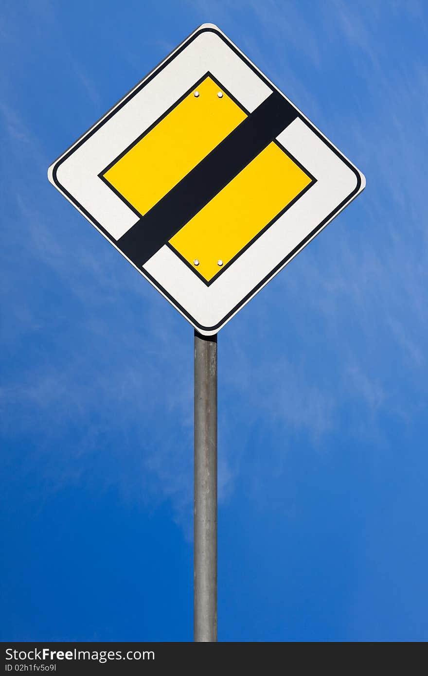 Road sign  on blu sky background