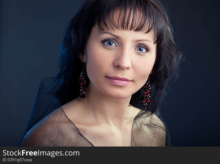 Beautiful young woman posing in studio