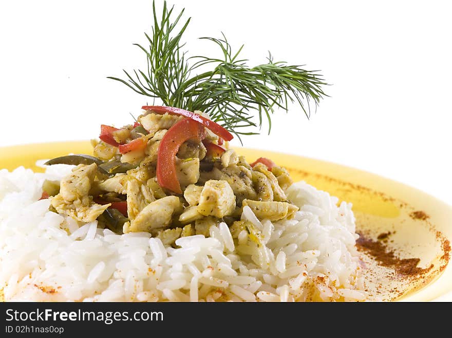 Meat with rice, decorated with pepper and dill. close up