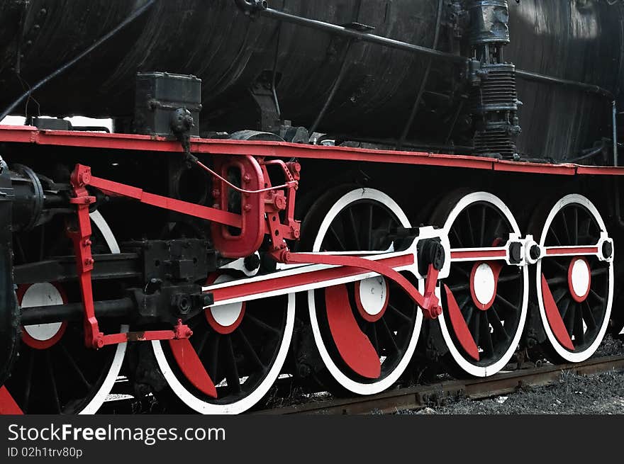 Train wheels on a old locomotive. Train wheels on a old locomotive