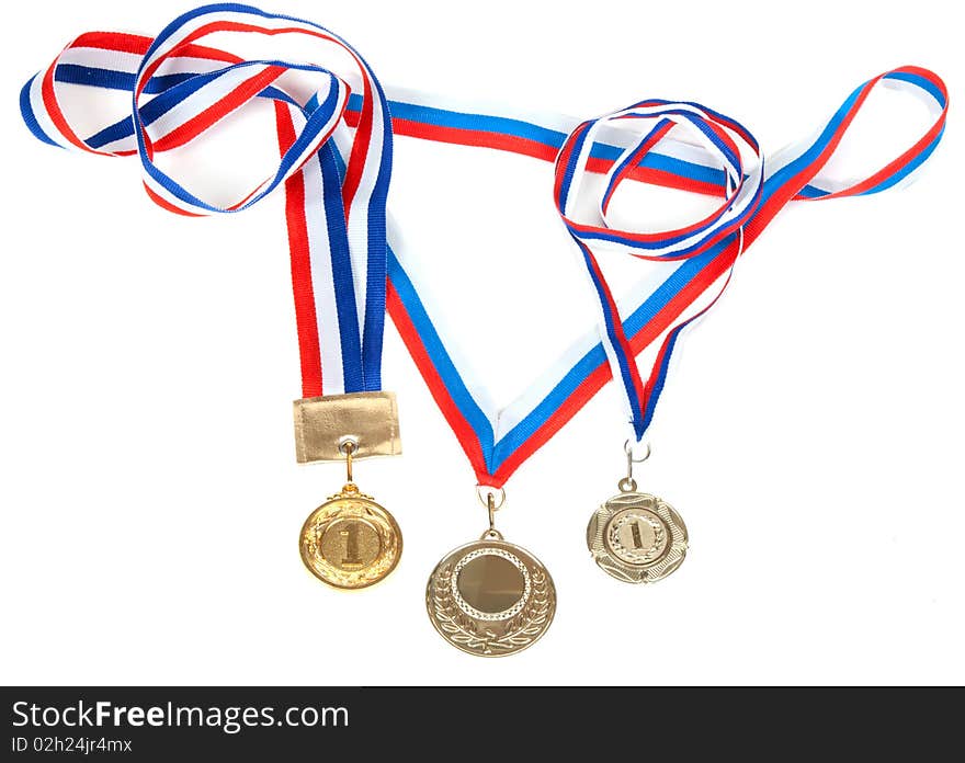 Three medals for first place with tape isolated on white