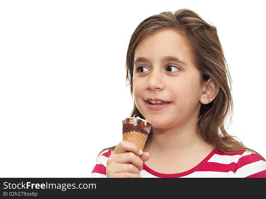 Small girl eating an ice cream cone on a white background