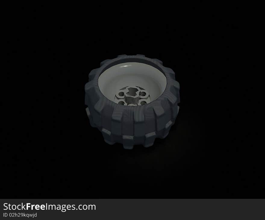 Isolated toy wheel on black background