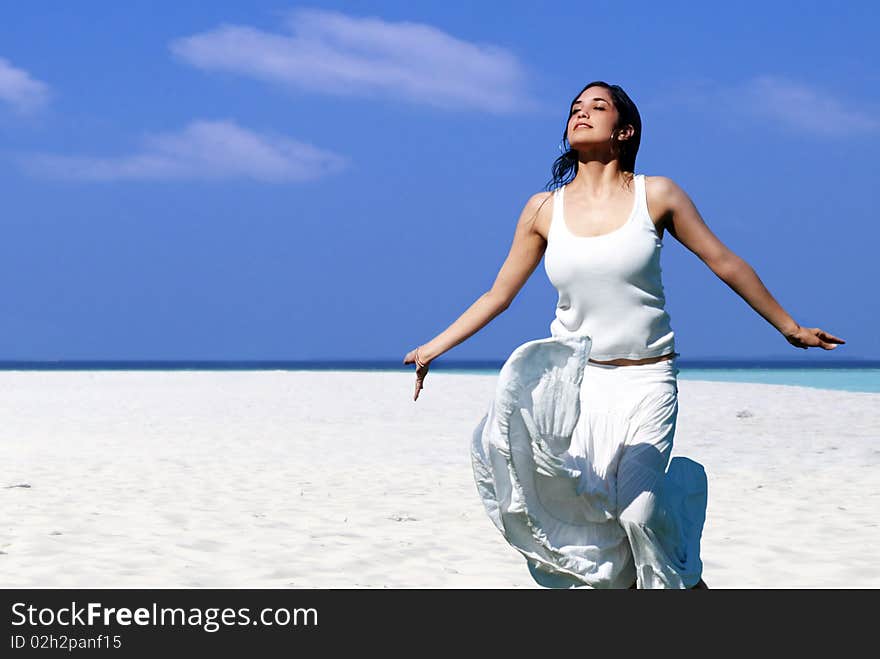 Happy woman on the beach