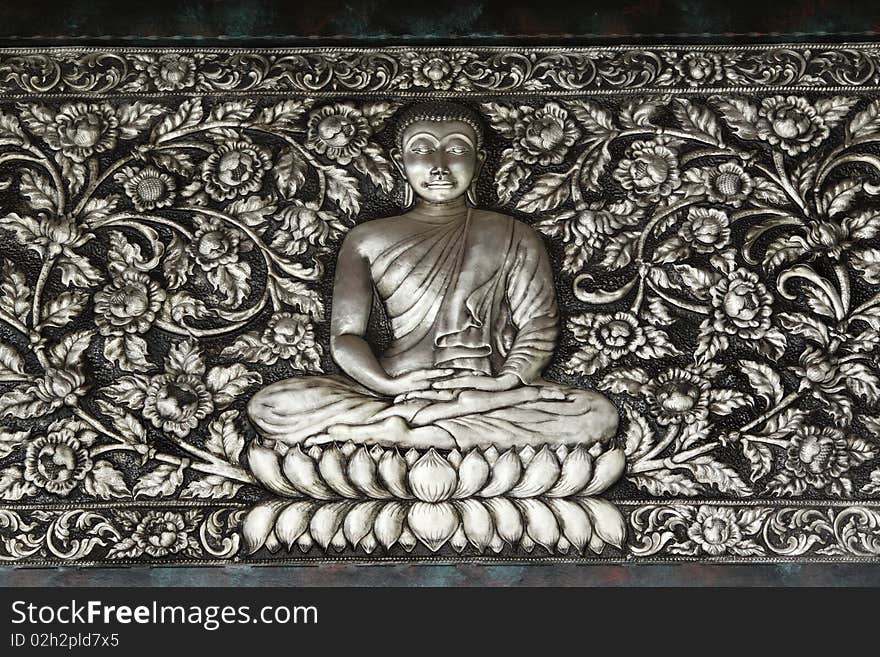 Pattern of buddha image  on wall of temple