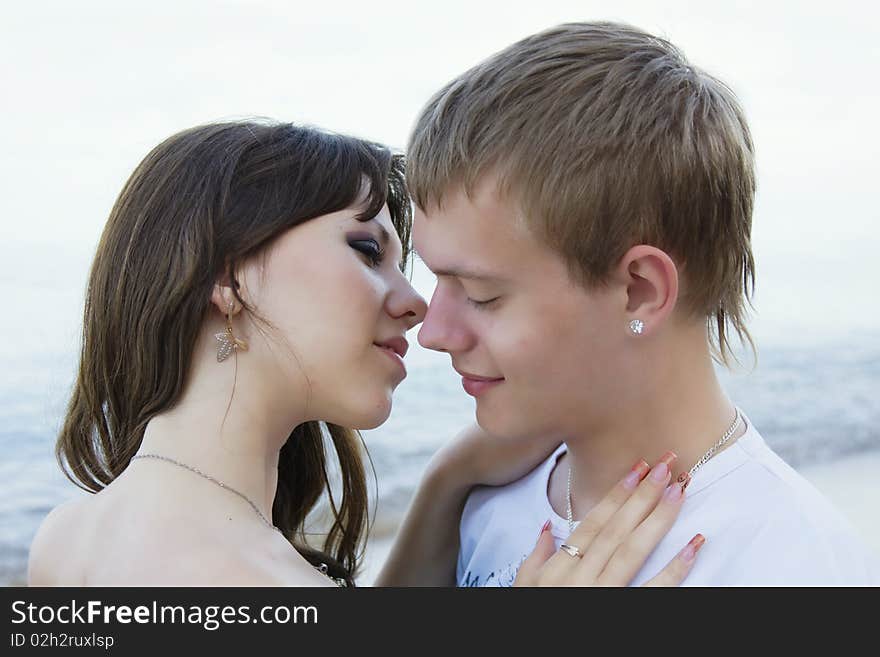 Couple enjoying themselves on the beach. Couple enjoying themselves on the beach