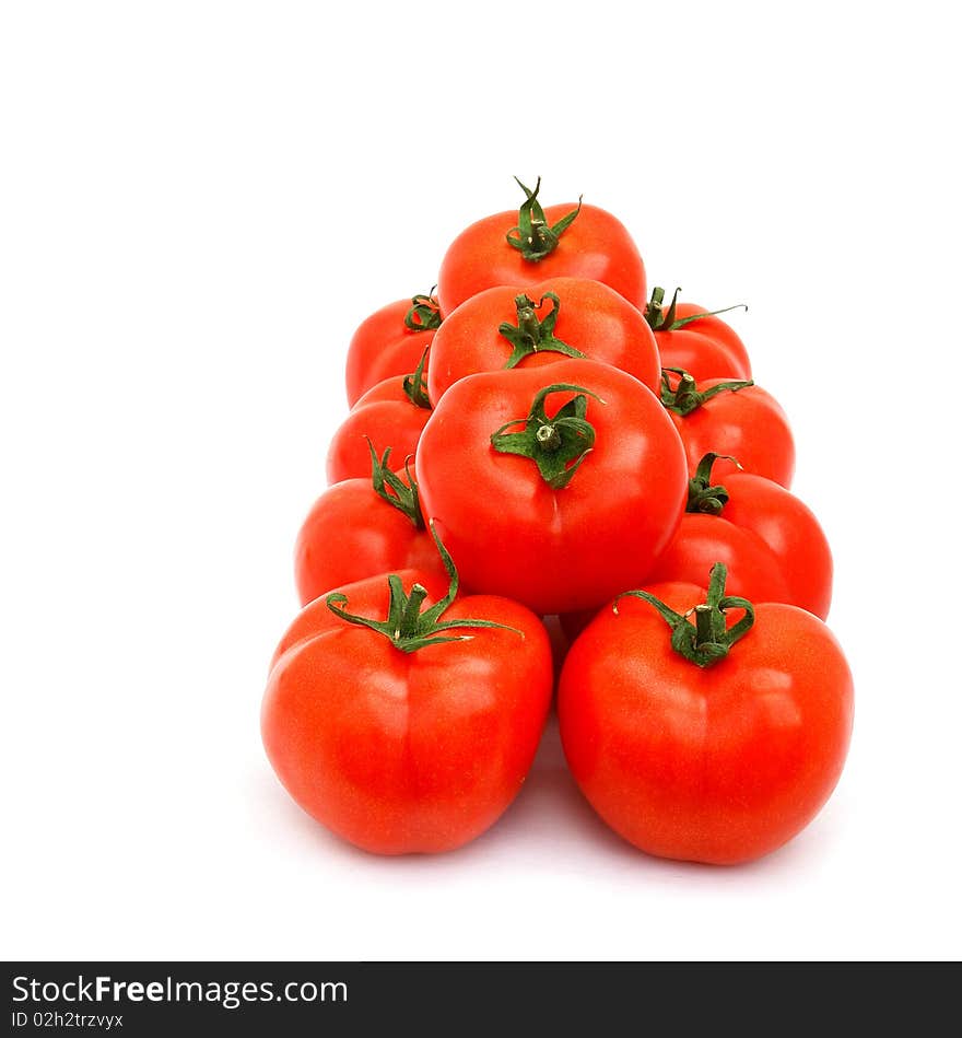 A few red tomatoes isolated on white. A few red tomatoes isolated on white