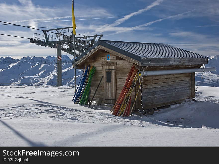 Lonely small house  on a mounting skiing resort in alps. Lonely small house  on a mounting skiing resort in alps