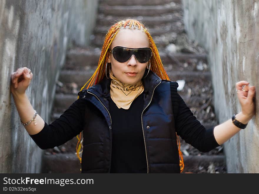 Young ginger caucasian girl with red dreadlocks. Young ginger caucasian girl with red dreadlocks