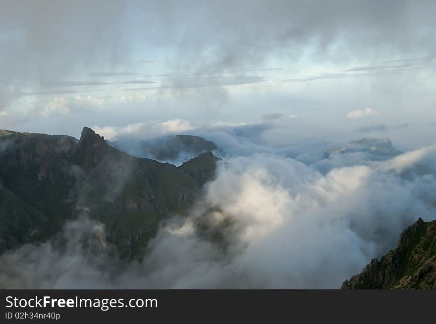 Mountains of Madeira island above the clouds at Pico do Areeiro and Ruivo. Mountains of Madeira island above the clouds at Pico do Areeiro and Ruivo