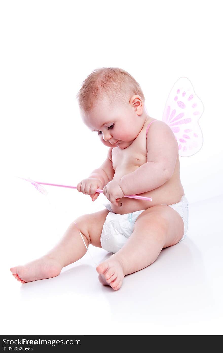 Little baby sitting on white background