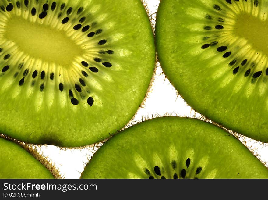 Kiwi fruit over a white background