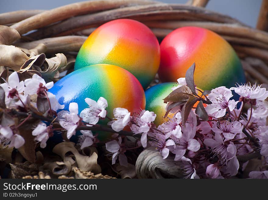 Colorful easter eggs in basket