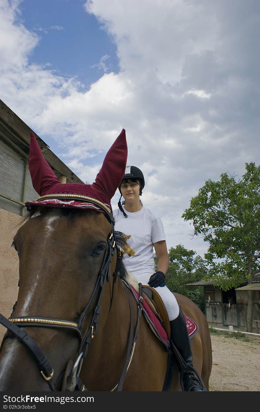 Girl riding horse