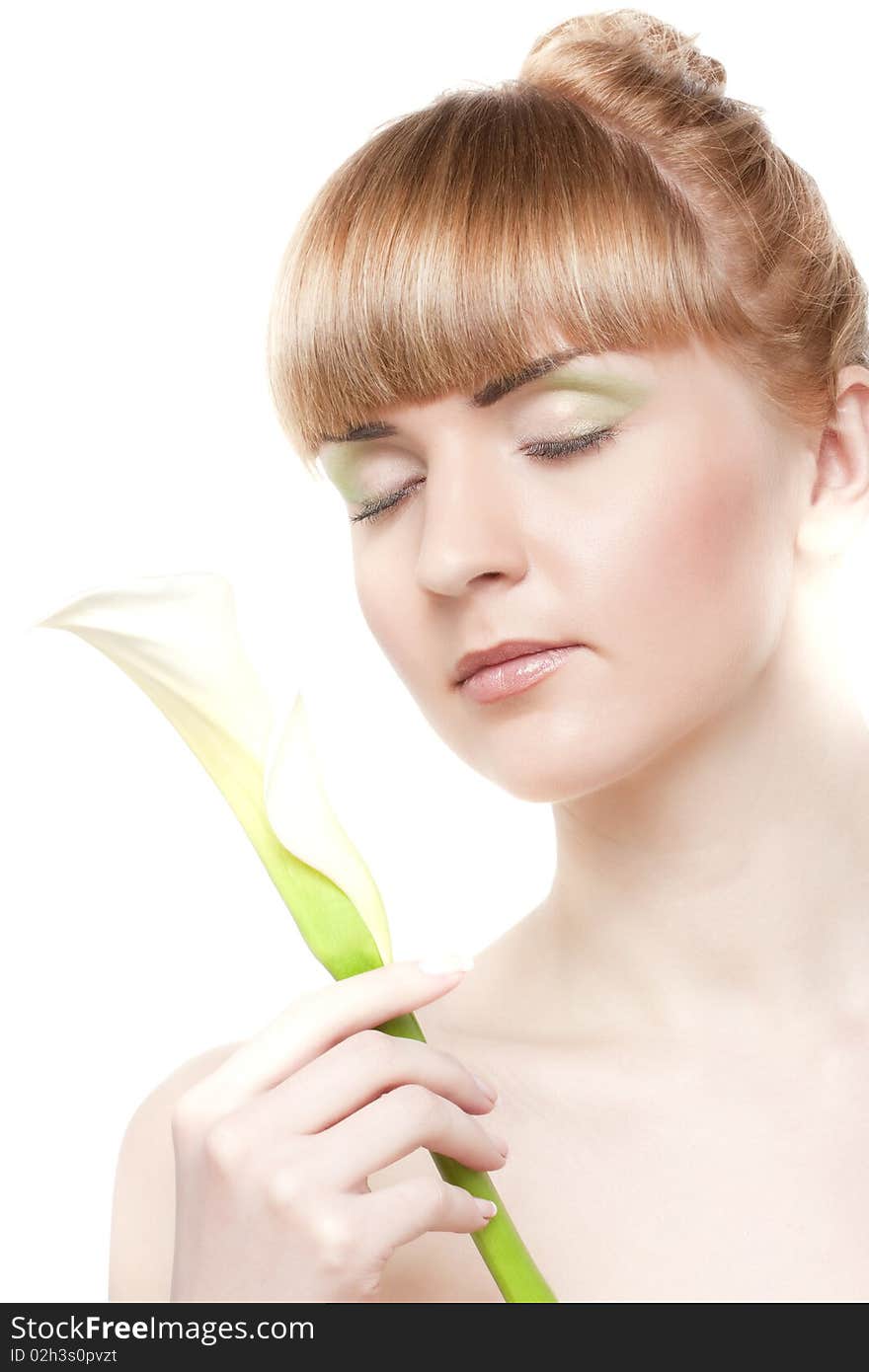 Young woman with a  white flower