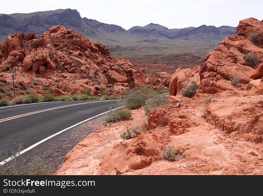 A lonely highway winding through the desert. A lonely highway winding through the desert