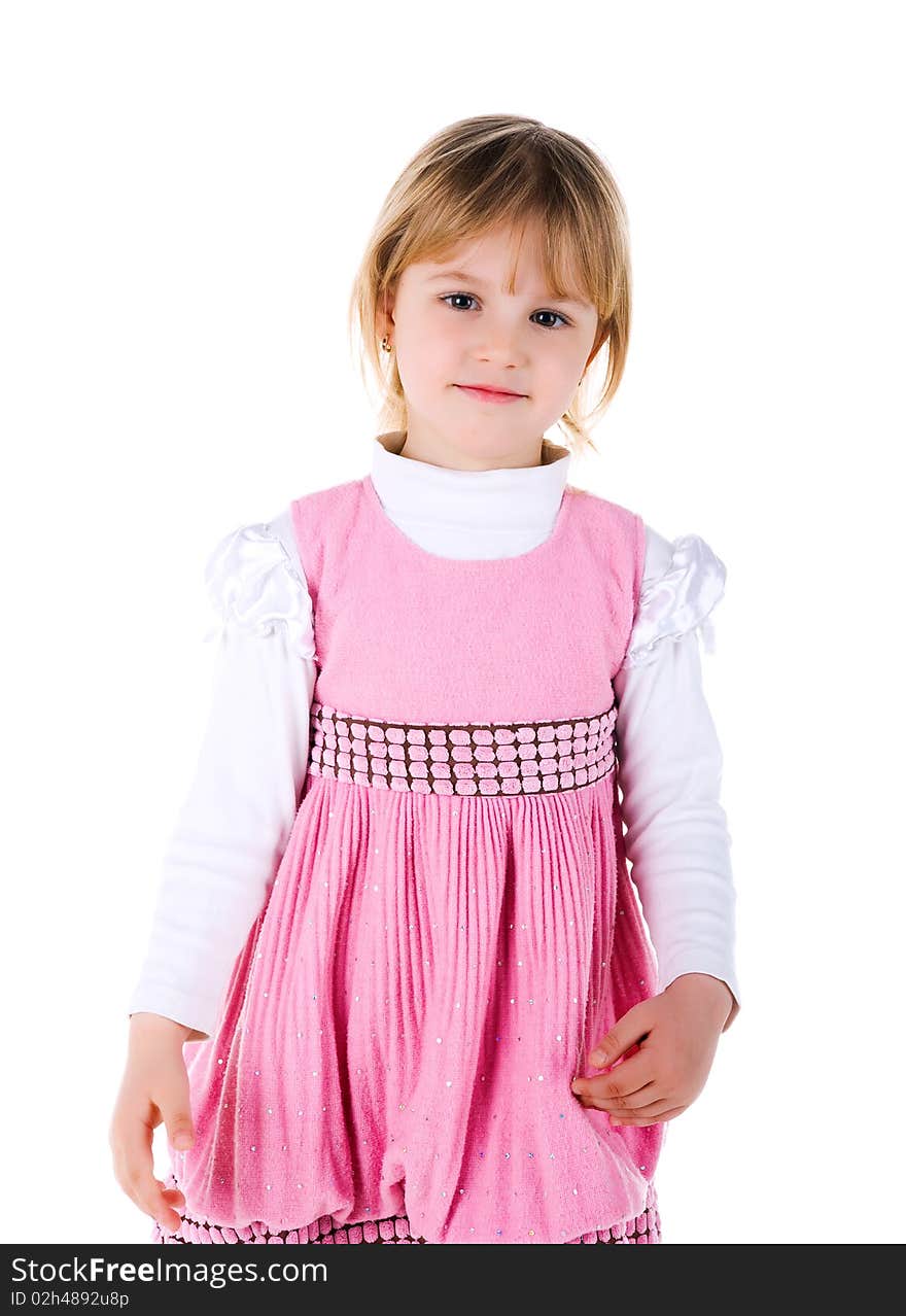 Cute little girl in a pink. Studio shot