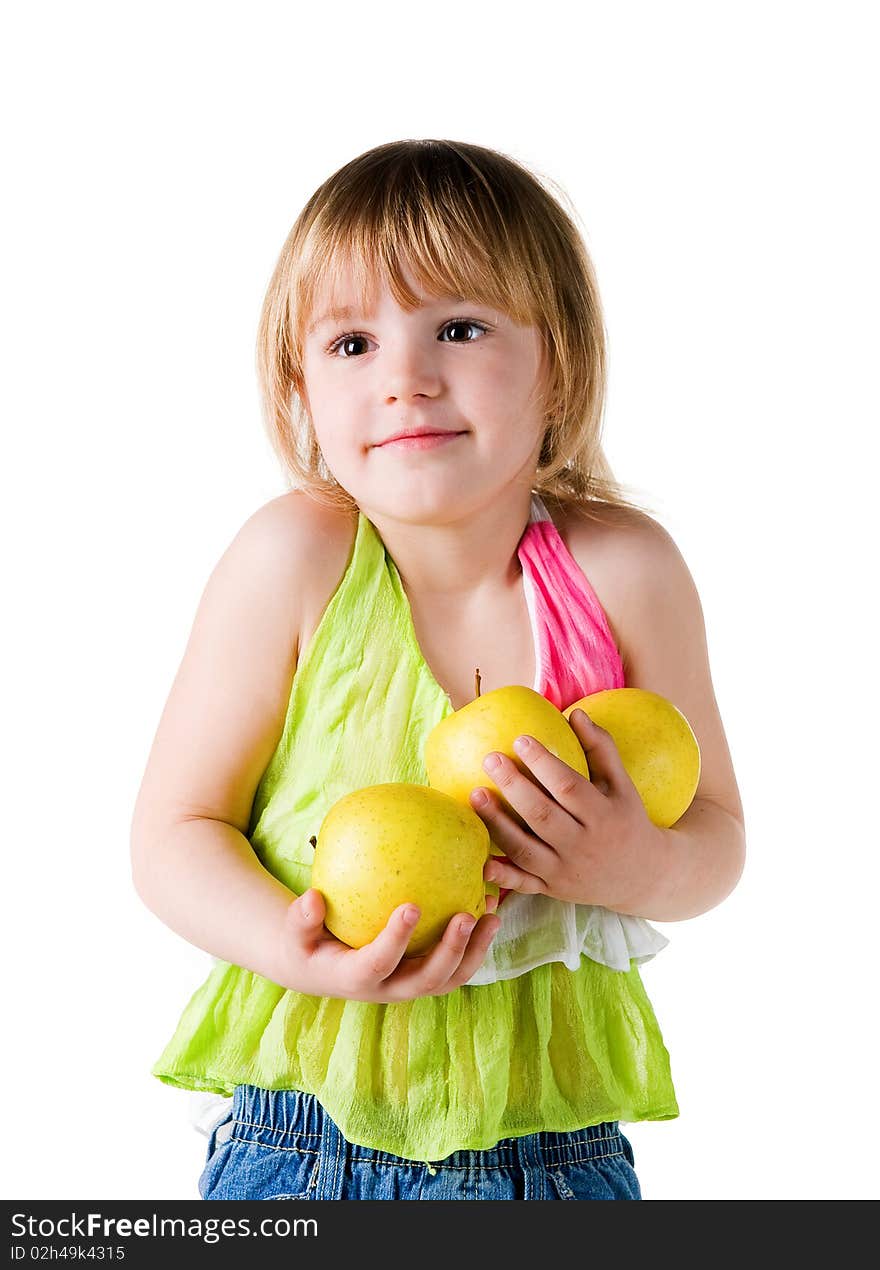 Little girl with armful of apples isolated on white background