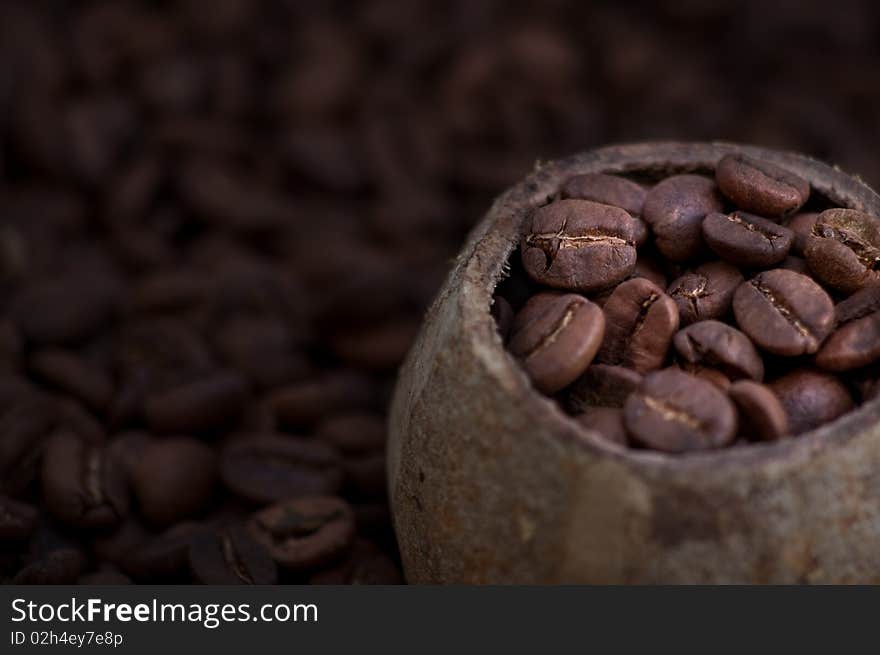 Lots roasted coffee beans, close up