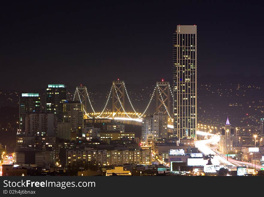 Bay Bridge and at night seen from San Francisco, California. Bay Bridge and at night seen from San Francisco, California.