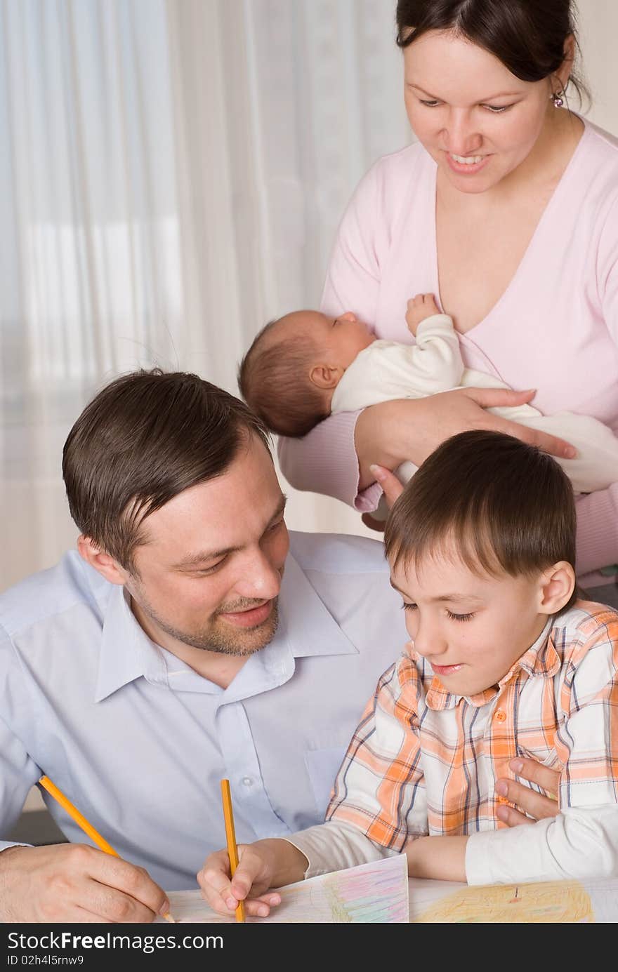 Couple With Two Children Resting