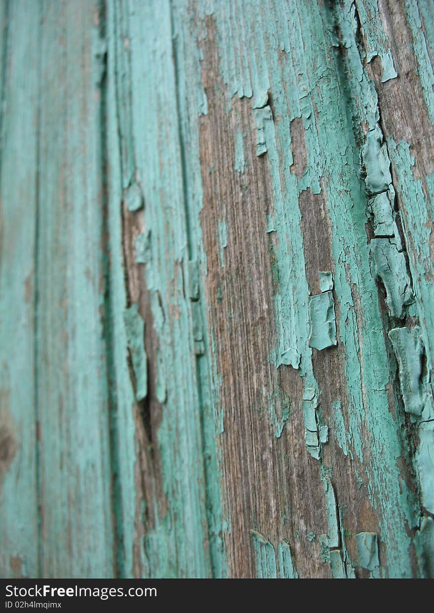 Old painted fence cracked from time to time. Old painted fence cracked from time to time