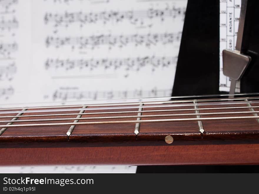 Closeup Guitar Neck, Notes and Metronome