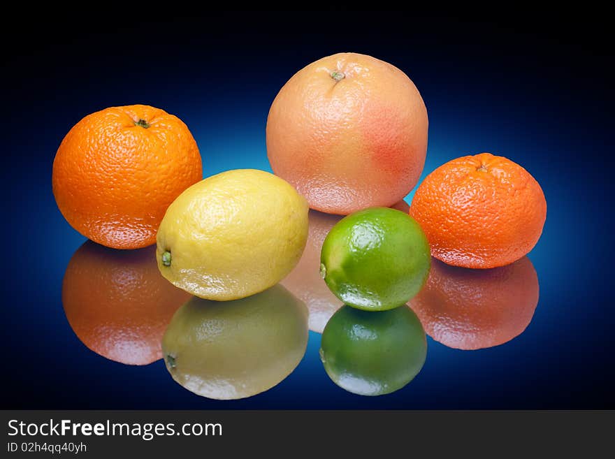 Arrangement of lemon, lime, tangerine, orange and grapefruit fruit. Arrangement of lemon, lime, tangerine, orange and grapefruit fruit