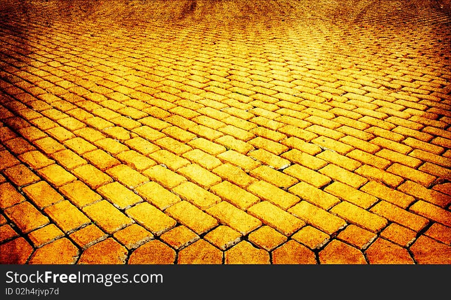 Yellow paved pavement