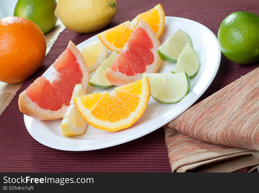 Arrangement of lemon, lime, tangerine, orange and grapefruit fruit. Arrangement of lemon, lime, tangerine, orange and grapefruit fruit