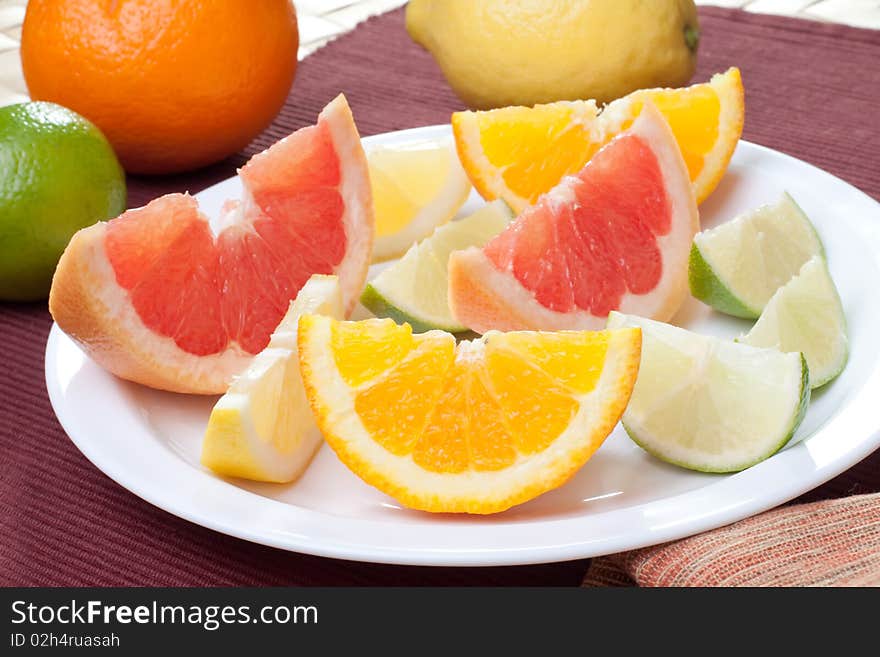 Arrangement of lemon, lime, tangerine, orange and grapefruit fruit. Arrangement of lemon, lime, tangerine, orange and grapefruit fruit