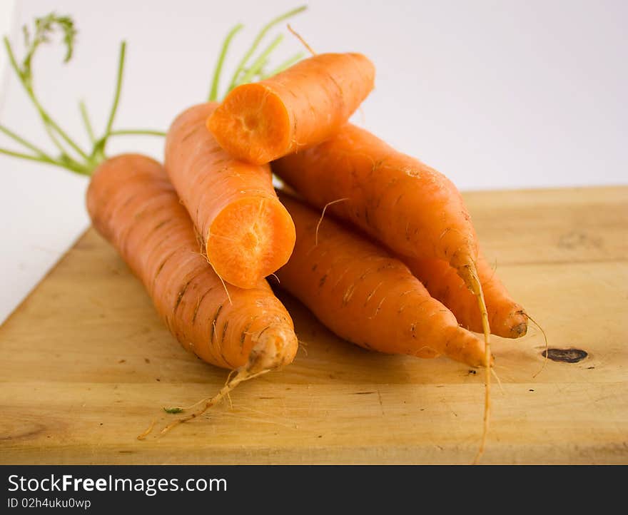 Carrots on the kitchen board. Carrots on the kitchen board.