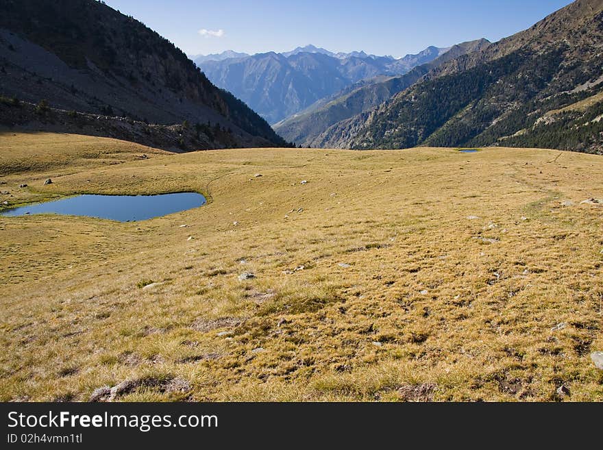 View from pass Rus in Aiguestortes and Estany de Sant Maurici National Park. Spain - Pyrenees. View from pass Rus in Aiguestortes and Estany de Sant Maurici National Park. Spain - Pyrenees.