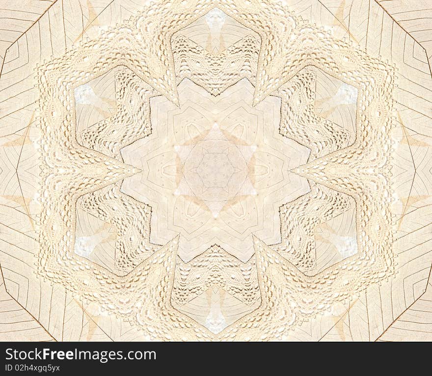 Symmetrical background with beige cotton lace and real, pressed leaves. Symmetrical background with beige cotton lace and real, pressed leaves.