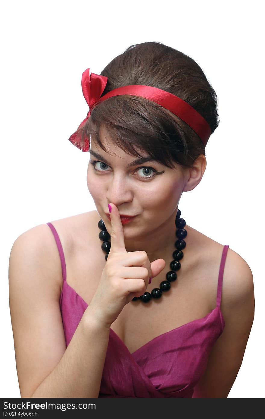 The young girl with a red bandage on a head gesture calls for silence. The young girl with a red bandage on a head gesture calls for silence