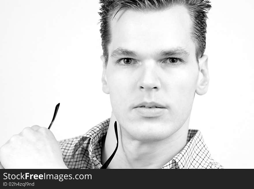 Portrait of a handsome and confident young businessman - looking into camera, isolated over white. He is now a professional part-time model. Portrait of a handsome and confident young businessman - looking into camera, isolated over white. He is now a professional part-time model