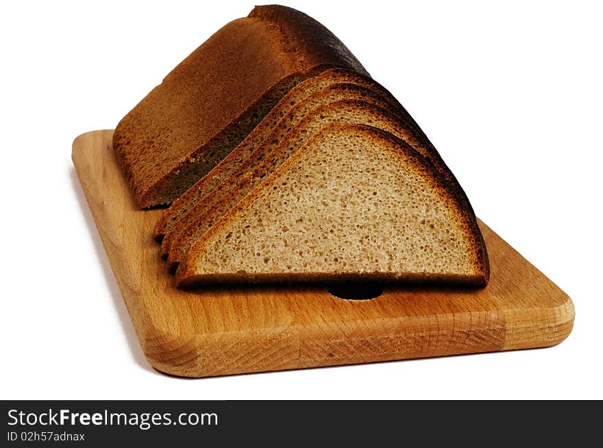 Rye bread on a breadboard isolated on a white