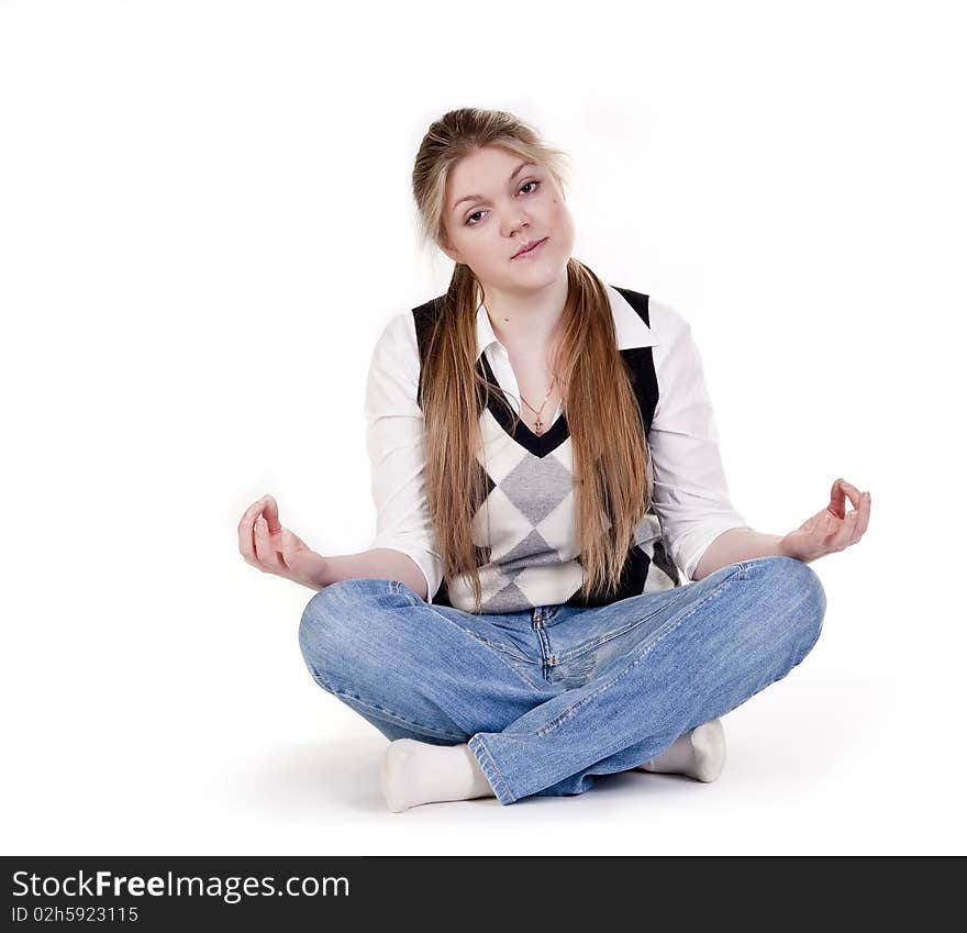 Blond woman meditating in lotus position isolated on white